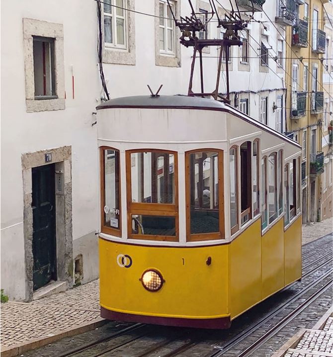 Yellow tuk-tuk in Lisbon